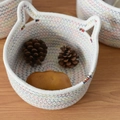 Detail of woven cotton storage basket with cat ears and colorful wave stitching - Small / White Rainbow Cat
