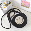 Borsa a tracolla tonda in paglia intrecciata nera con motivo faccina sorridente - Nero