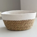 Oval woven plant basket with white rope top and natural straw bottom finish - White