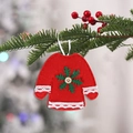 Mini red Christmas sweater ornament with white lace and green snowflake on pine branch - Christmas Red Clothes