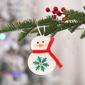 Felt snowman Christmas ornament with red scarf and embroidery hanging on pine branch - Christmas Red Scarf Snowman