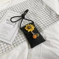 Small black knitted crossbody bag featuring a sunflower decor and colorful pompom charms - Black (Sunflower Style)