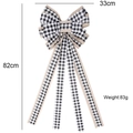 Large black and white buffalo plaid Christmas bow with rustic brown edges and long tails - Black and White Plaid