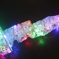 Weihnachts-LED-Netzband mit goldenen Musikmotiven und festlichem bunten Leuchteffekt - 10m / Bronzierendes Silber (Buntes Licht)