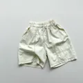 Detail view of cotton shorts for kids with elastic waistband and decorative stitching - 80 / Beige Apricot