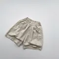 Détail de short en coton et lin pour enfants avec taille élastique et grandes poches - Khaki / 80cm