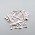 Detailed view of pink and white striped cotton T-shirt with soft fabric texture and round neck - 80cm / Silt Pink