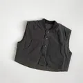 Vista detallada del chaleco reversible para niños con forro de cuadros - 80cm / gris oscuro
