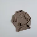 Detail of children's brown ribbed knit sweater with dark contrast piping on collar and cuffs - 80cm / Khaki