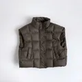 Detailed view of kids dark brown puffer vest featuring square quilting and stand collar - Dark Brown / 80cm