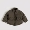 Close-up of olive green down shirt jacket for kids with dual flap pockets and snap buttons - 80cm / Brown