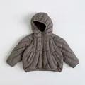 Close-up of kids coffee brown down jacket with radial stitching and resin zipper - Light Coffee / 80cm