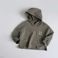 Close-up of kids hooded sweatshirt with lucky text print and split side hem detail - 80 / Tea Brown