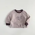 Detailed shot of ribbed cuffs and high-quality artistic printing on children's sweatshirt - 80cm / Lotus root pink