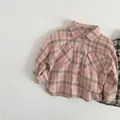 Detail of pink plaid kids flannel shirt featuring double chest pockets and soft fabric - Pink Plaid / 80cm