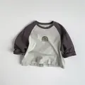 Detail of soft cotton kids long sleeve tee with raglan sleeves and minimalist print - 80cm / Light Silver Grey