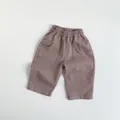 Detail von Kinderfreizeithose mit elastischem Bund und großen Fronttaschen aus Baumwolle - 120cm / Ascherosa