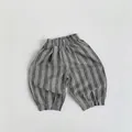 Detailed close-up of striped kids harem pants showing elastic waist and cotton linen texture - 80 / Light Gray Stripe