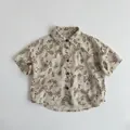 Camicia bambino stile coreano panna a maniche corte, stampa foglie marroni e bottoni neri - Caffè Albicocca / 80cm