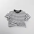 Detailed flat lay of a kids loose striped T-shirt with black crew neck and soft cotton texture - 80cm / Black & White Stripes