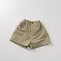 Detailed view of kids cotton linen khaki shorts with elastic waist and side pockets - 80 / Khaki