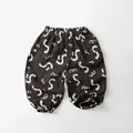 Detail of breathable double-layer cotton gauze trousers for kids with abstract print - Dark Gray / 80cm