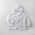 Detailed view of lightweight kids sun protection jacket with hood and front zipper closure - 80cm / White