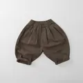 Detail of children's wide-leg cotton pants with elastic high waist and cuffed hems - 80 / Tea Brown
