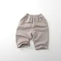 Detail view of cotton kids sweatpants featuring elastic waistband and soft texture - 80cm / Grey-Beige
