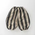 Detailed view of elastic waistband and wide striped texture on children's loose pants - Apricot Stripe / 80cm