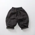 Detalle de pantalones gruesos para niños con forro polar y dobladillos en los tobillos - 80cm / gris oscuro