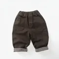 Detail of kids brown fleece pants with elastic waist and stylish plaid folded cuffs - 80cm / Olive Green