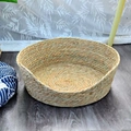 Detail of hand-woven natural seagrass cat bed with a low-entry front for easy pet access - Slanted High Bare Cat Nest