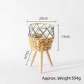 Handwoven rattan plant stand with black metal frame and natural wooden legs, 20cm diameter - Water Hyacinth Wood Legs Small