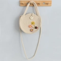 Handmade round woven straw crossbody bag in beige with colorful floral decor and ladybug - 20x20cm / Beige with Flowers