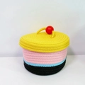 Close-up of a multi-colored woven cotton rope storage basket with a bright yellow lid - Yellow Lid
