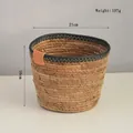 Dettaglio del cesto portaoggetti in erba marina intrecciata con bordo nero e manico in pelle - Piccolo 21x16cm