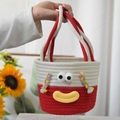 Borsa a secchiello tessuta in cotone rosso e bianco fatta a mano con viso a fumetti - Ometto Con Treccine