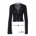Close-up of black V-neck cropped top with delicate lace trim and button detail - Black