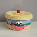 Round woven basket with lid and cartoon face in yellow blue and green colors - Pale Yellow Lid - Smiling Face