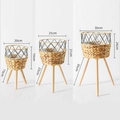 Set of three woven grass planters with wooden legs in various sizes for indoor plants - Gourd Grass Three Items Collection