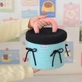 Sky blue woven storage basket with pink handle and black bow details for home decor - Cyan Bow (22*19)
