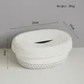 Details van de geweven katoenen tissuebox van 23x15x10cm met zwarte stiksels voor de kamer - Wit met zwarte lijn