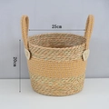 Detail of woven plant basket with gold metallic accents and heart-shaped leather patches - 直筒款拼卡金小号