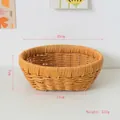 Dettaglio di un cesto intrecciato 20x13x7cm per conservare frutta o pane in cucina - Piccolo