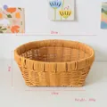 Dettaglio del cesto intrecciato con dimensioni di 26 cm di larghezza e 9 cm di altezza - Grande