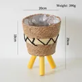 Dettaglio di cesto intrecciato con rivestimento impermeabile e tre gambe in legno giallo - Paglia e Corda di Carta - Piccolo