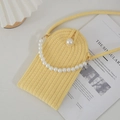 Mini lemon yellow woven crossbody bag with large pearl handle and button closure - Pale Yellow With Pearl Handle