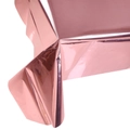 Macro detail of glossy rose gold disposable foil tablecloth with reflective metallic texture - Rose Gold