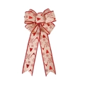 Dettaglio del fiocco natalizio in juta beige con stampe di renne rosse e fiocchi di neve - Fiocco Albero di Natale